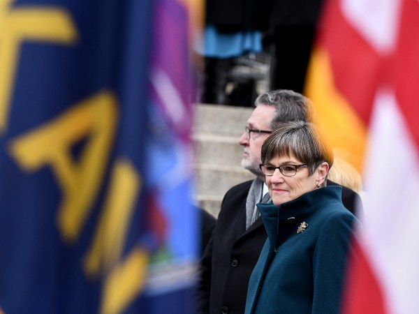 Laura Kelly, right, is sworn in as the 48th governor of Kansas by Chief Justice of the Kansas Supreme Court Lawton Nuss during a ceremony in front of the statehouse Monday, Jan. 14, 2019 in Topeka, Kan. (Jill Toyoshiba/The Kansas City Star/TNS)