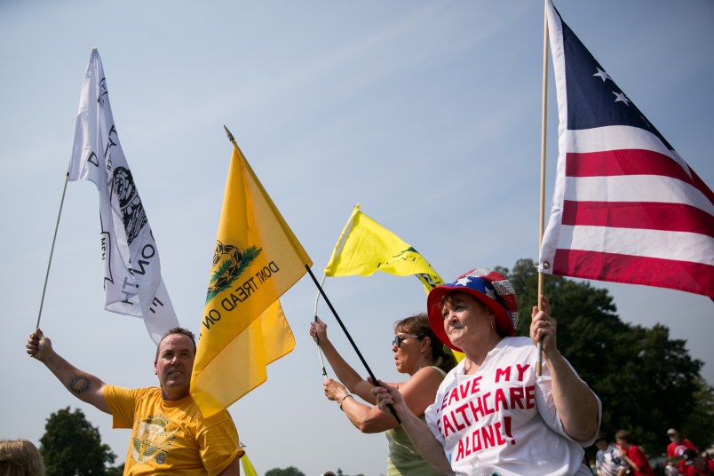 WASHINGTON, DC - SEPTEMBER 10:during a "Exempt America from Obamacare" rally, on Capitol Hill, September 10, 2013 in Washington, DC. Some conservative lawmakers are making a push to try to defund the health care law as part of the debates over the budget and funding the federal government. (Photo by Drew Angerer/Getty Images)