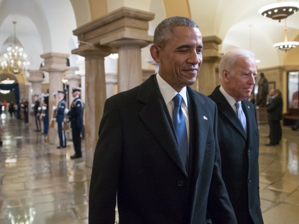 President Barack Obama and Vice President Joe Biden walk through the Crypt of the Capitol for Donald Trump’s inauguration ceremony, in Washington, Friday, Jan. 20, 2017. (AP Photo/J. Scott Applewhite, Pool)