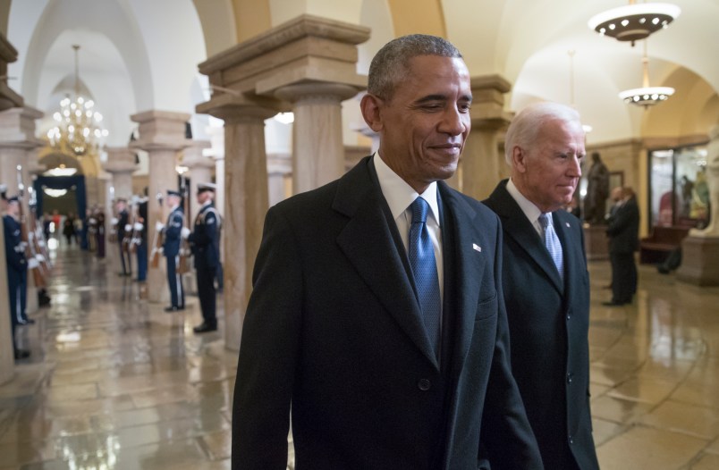 President Barack Obama and Vice President Joe Biden walk through the Crypt of the Capitol for Donald Trump’s inauguration ceremony, in Washington, Friday, Jan. 20, 2017. (AP Photo/J. Scott Applewhite, Pool)