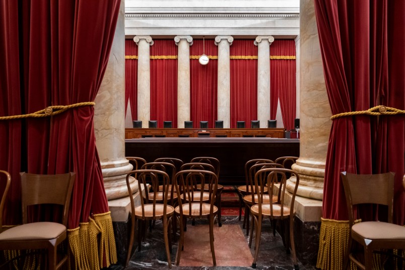 The empty courtroom is seen at the U.S. Supreme Court in Washington as the justices prepare final decisions of the high court's term, Monday, June 24, 2019. (AP Photo/J. Scott Applewhite)