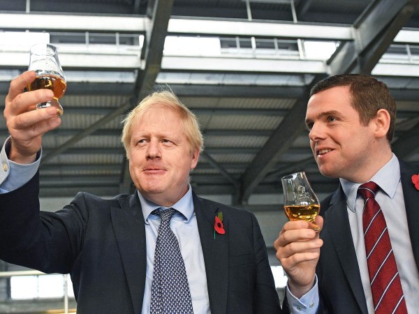 File photo dated 07/11/19 of Prime Minister Boris Johnson (left) alongside Douglas Ross, parliamentary under-secretary of state for Scotland, who has resigned from the Government over Dominic Cummings' alleged breach of lockdown rules. PA Photo. Issue date: Tuesday May 26, 2020. See PA story HEALTH Coronavirus. Photo credit should read: Stefan Rousseau/PA Wire