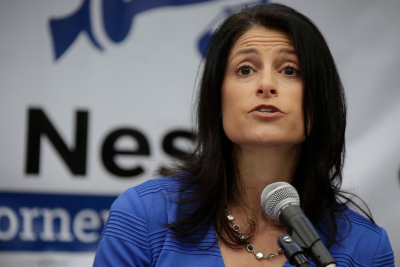 Attorney Dana Nessel, surrounded by her family, announces her bid for Michigan Attorney General in Braun Court Ann Arbor on Tuesday, Aug. 15, 2017. (Mandi Wright/Detroit Free Press/TNS)