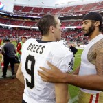 San Francisco 49ers quarterback Colin Kaepernick, right, is greeted by New Orleans Saints quarterback Drew Brees at the end of an NFL football game Sunday, Nov. 6, 2016, in Santa Clara, Calif. New Orleans won the game. (AP Photo/D. Ross Cameron)