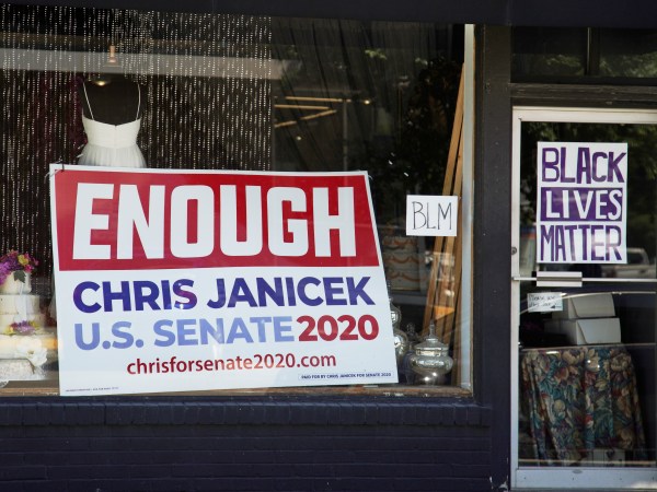 An election sign for Democratic Senate candidate Chris Janicek is seen in Omaha, Neb., Tuesday, June 16, 2020. The Nebraska Democratic Party is calling on its U.S. Senate nominee to drop out of the race after he made sexually repugnant comments about a campaign staffer in a group text with her and other staffers. The party says its state executive committee voted unanimously on Monday to withdraw all of its resources from Chris Janicek’s campaign. (AP Photo/Nati Harnik)
