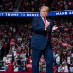 President Donald Trump arrives on stage to speak at a campaign rally at the BOK Center, Saturday, June 20, 2020, in Tulsa, Okla. (AP Photo/Evan Vucci)