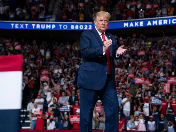 President Donald Trump arrives on stage to speak at a campaign rally at the BOK Center, Saturday, June 20, 2020, in Tulsa, Okla. (AP Photo/Evan Vucci)