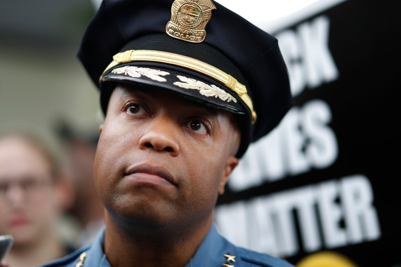 Minneapolis Police Chief Medaria Arradondo left, listened as north side community members held a protest and rally at the 4th precinct on Plymouth avenue in response to the shooting death of Thurman Blevins by Minneapolis Police  Sunday June 24, 2018 in Minneapolis , MN. ]  JERRY HOLT • jerry.holt@startribune.com