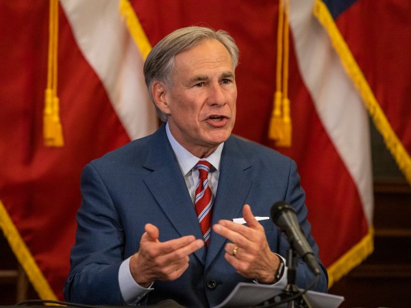 Texas Governor Greg Abbott announces the reopening of more Texas businesses during the COVID-19 pandemic at a press conference at the Texas State Capitol in Austin on Monday, May 18, 2020. Abbott said that childcare facilities, youth camps, some professional sports, and bars may now begin to fully or partially reopen their facilities as outlined by regulations listed on the Open Texas website. (Lynda M. Gonzalez/The Dallas Morning News Pool)