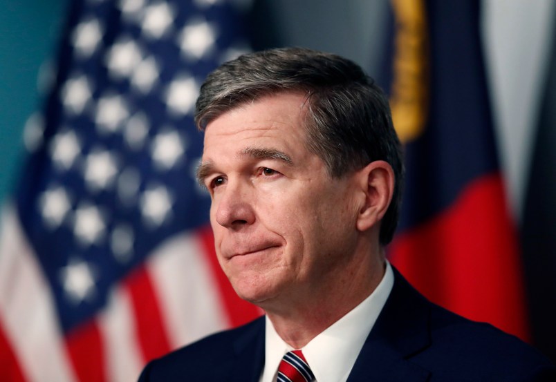 North Carolina Gov. Roy Cooper listens to a question during a briefing on the coronavirus pandemic at the Emergency Operations Center in Raleigh, N.C., Tuesday, May 26, 2020. (Ethan Hyman/Raleigh News & Observer/TNS)