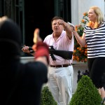 Armed homeowners standing in front of their house along Portland Place confront protesters as they march to Mayor Lyda Krewson's house on Sunday, June 28, 2020, in the Central West End in St. Louis. (Laurie Skrivan/St. Louis Post-Dispatch/TNS)