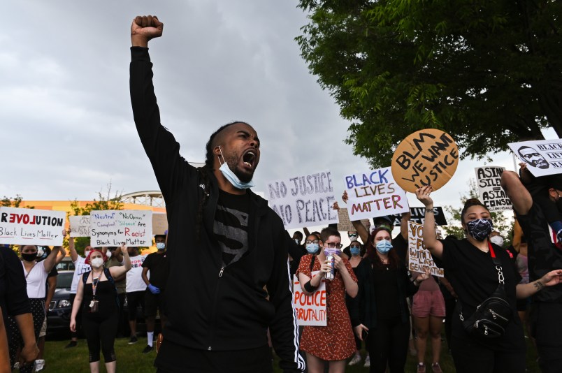 Erick Valerio, of Ronkonkoma, shouts before protestors walk down Old Country Road from Westbury towards Garden City in the death of George Floyd, Saturday, June 6, 2020.