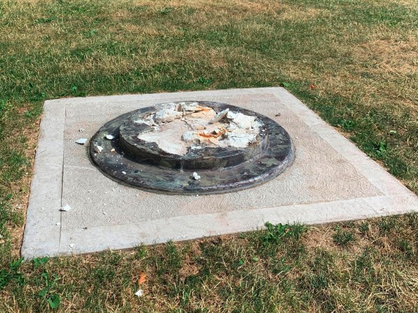 This photo provided by WROC-TV shows the remnants of a Frederick Douglass statue ripped from its base at a park in Rochester, N.Y., Sunday, July 5, 2020. The statue of abolitionist Douglass was ripped on the anniversary of one of his most famous speeches, delivered in that city in 1852. (Ben Densieski/WROC-TV)