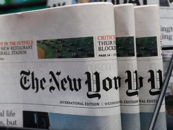 The New York Times newspaper are displayed for sale at a news stand in Hong Kong, Wednesday, July 15, 2020. The New York Times said Tuesday it will transfer some of its staff out of Hong Kong because of the uncertainties about practicing journalism in the Chinese territory under its newly imposed national security law. (AP Photo/Kin Cheung)