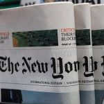 The New York Times newspaper are displayed for sale at a news stand in Hong Kong, Wednesday, July 15, 2020. The New York Times said Tuesday it will transfer some of its staff out of Hong Kong because of the uncertainties about practicing journalism in the Chinese territory under its newly imposed national security law. (AP Photo/Kin Cheung)