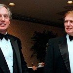 FILE - In this Nov. 3, 1999 file photo, Robert Trump, left, joins real estate developer and presidential hopeful Donald Trump at an event in New York. A tell-all book by President Donald Trump's niece cannot be published until a judge decides the merits of claims by the president's brother, her uncle Robert Trump, that its publication would violate a pact among family members, a judge said Tuesday, June 30, 2020. (AP Photo/Diane Bonadreff, File)