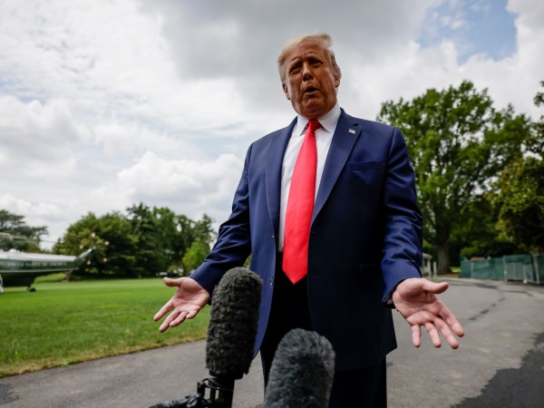 WASHINGTON, DC - AUGUST 06: President Donald Trump stops to talk to reporters as he departs the White House for a trip to Ohio where he will visit a Whirlpool factory on August 6, 2020 in Washington, DC. After the visit to the factory he will attend a fundraising reception and then head to his properties in New Jersey for the weekend. (Photo by Samuel Corum/Getty Images) *** Local Caption *** Donald Trump