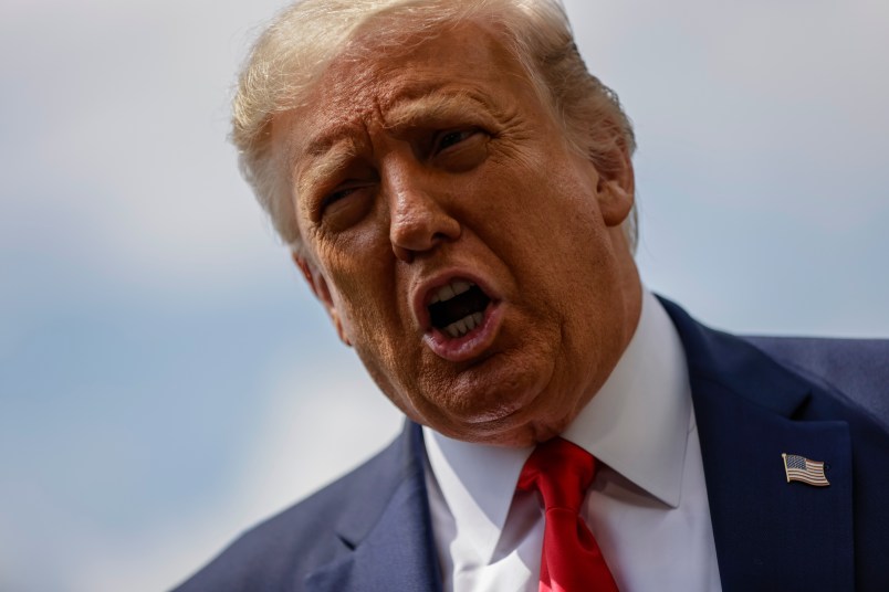 WASHINGTON, DC - AUGUST 06: President Donald Trump stops to talk to reporters as he departs the White House for a trip to Ohio where he will visit a Whirlpool factory on August 6, 2020 in Washington, DC. After the visit to the factory he will attend a fundraising reception and then head to his properties in New Jersey for the weekend. (Photo by Samuel Corum/Getty Images) *** Local Caption *** Donald Trump