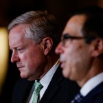 WASHINGTON, DC - AUGUST 06: White House Chief of Staff Mark Meadows (L) and Treasury Secretary Steven Mnuchin (R) speak to reporters following continued negotiations with Speaker of the House Nancy Pelosi (D-CA) and Senate Minority Leader Chuck Schumer (D-NY) on a new economic relief bill in response to the coronavirus pandemic on Capitol Hill on August 6, 2020 in Washington, DC. The White House and Congressional Democrats have yet to come to an agreement on what the new relief bill will include despite the CARES Act expiring on July 31st. (Photo by Samuel Corum/Getty Images) *** Local Caption *** Steve Mnuchin; Mark Meadows