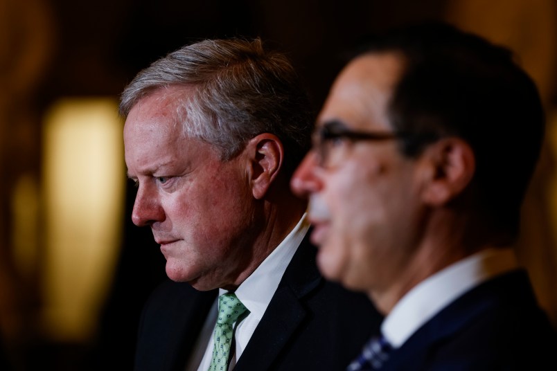 WASHINGTON, DC - AUGUST 06: White House Chief of Staff Mark Meadows (L) and Treasury Secretary Steven Mnuchin (R) speak to reporters following continued negotiations with Speaker of the House Nancy Pelosi (D-CA) and Senate Minority Leader Chuck Schumer (D-NY) on a new economic relief bill in response to the coronavirus pandemic on Capitol Hill on August 6, 2020 in Washington, DC. The White House and Congressional Democrats have yet to come to an agreement on what the new relief bill will include despite the CARES Act expiring on July 31st. (Photo by Samuel Corum/Getty Images) *** Local Caption *** Steve Mnuchin; Mark Meadows