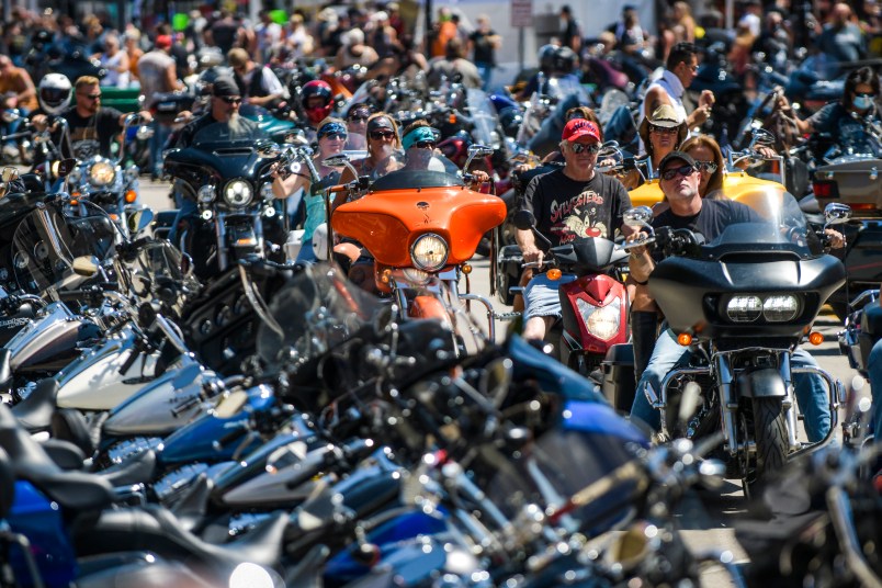 STURGIS, SD - AUGUST 07: Motorcyclists ride down Main Street during the 80th Annual Sturgis Motorcycle Rally on August 7, 2020 in Sturgis, South Dakota. While the rally usually attracts around 500,000 people, officials estimate that more than 250,000 people may still show up to this year's festival despite the coronavirus pandemic. (Photo by Michael Ciaglo/Getty Images)