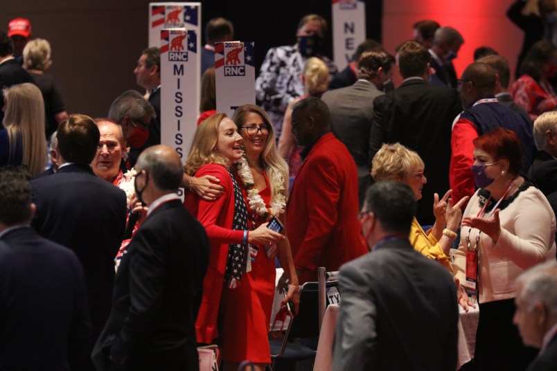 NYTRNC20A crowd mingles at the conclusion of President Trump’s speech to delegates in the Charlotte Convention Center’s Richardson Ballroom in Charlotte, NC on Monday, August 24. The delegates have gathered for the roll call vote to renominate Donald J. Trump to be President of the United States and Mike Pence to be Vice President.(Travis Dove for The New York Times)