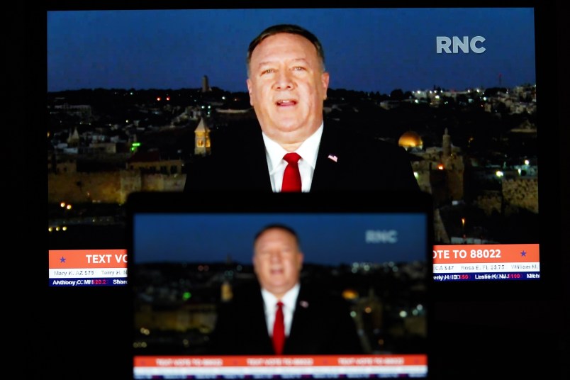 WASHINGTON, Aug. 26, 2020 -- Photo taken on Aug. 25, 2020 shows screens displaying U.S. Secretary of State Mike Pompeo giving a speech to the Republican National Convention (RNC) from Jerusalem. U.S. House Democrat Joaquin Castro on Tuesday announced that he had launched an investigation into Secretary of State Mike Pompeo's speech to the RNC on Tuesday night. (photo by Liu Jie/Xinhua via Getty)