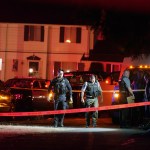Police officials work at a scene where a man suspected of fatally shooting a supporter of a right-wing group in Portland, Oregon, last week was killed as investigators moved in to arrest him in Lacey, Wash., on Thursday, Sept. 3, 2020. (AP Photo/Ted Warren)