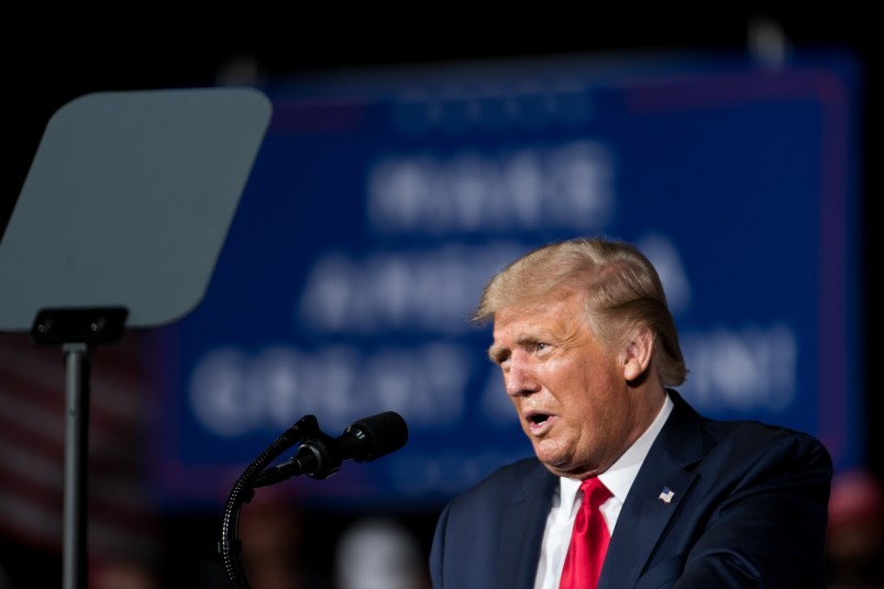 WINSTON SALEM, NC - SEPTEMBER 08: President Donald Trump addresses a crowd during a campaign rally at Smith Reynolds Airport on September 8, 2020 in Winston Salem, North Carolina. The president also made a campaign stop in South Florida on Tuesday. (Photo by Sean Rayford/Getty Images)