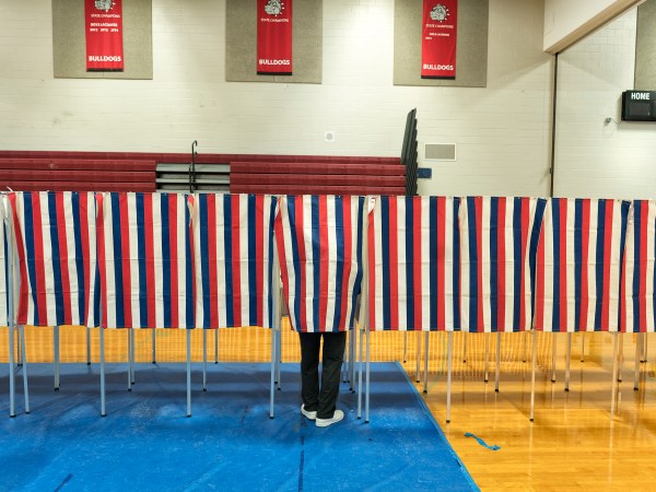 BEDFORD, NH - FEBRUARY 9: Voters head to the polling booths inside the Bedford High school, February 9, 2016 in Bedford, New Hampshire. (Photos by Charles Ommanney/The Washington Post)