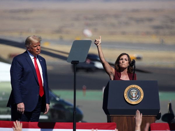 PRESCOTT, AZ - OCTOBER 19: U.S. President Donald Trump watches as Senator Martha McSally (R-AZ) speaks at a “Make America Great Again” campaign rally on October 19, 2020 in Prescott, Arizona. With almost two weeks to go before the November election, President Trump is back on the campaign trail with multiple daily events as he continues to campaign against Democratic presidential nominee Joe Biden. (Photo by Caitlin O'Hara/Getty Images)