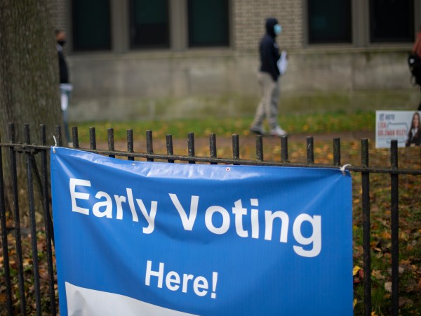 PHILADELPHIA, PA - OCTOBER 27:  Vvoters queue outside of a satellite polling station on October 27, 2020 in Philadelphia, Pennsylvania.  With the election only a week away, this new form of in-person voting by using mail ballots, has enabled tens of millions of voters to cast their ballots before the general election. Vying to recapture the Keystone State’s vital 20 electoral votes in order to bolster his reelection prospects, President Donald Trump held three rallies throughout Pennsylvania yesterday.  (Photo by Mark Makela/Getty Images)