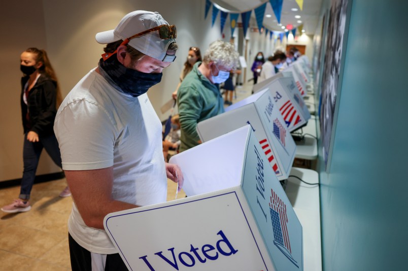 CHARLESTON, SC - OCTOBER 30: Jake Hannay casts his in-person absentee ballot at Seacoast Church West Ashley on October 30, 2020 in Charleston, South Carolina. (Photo by Michael Ciaglo/Getty Images)