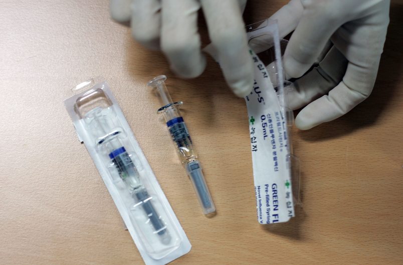 A man receives a H1N1 swine flu vaccine at XXXXX on October 27, 2009 in Seoul, South Korea. The Korea Food and Drug Administration approved domestically developped vaccines last week, the government plan to vaccinate 35 percent of South Korean population until next February.