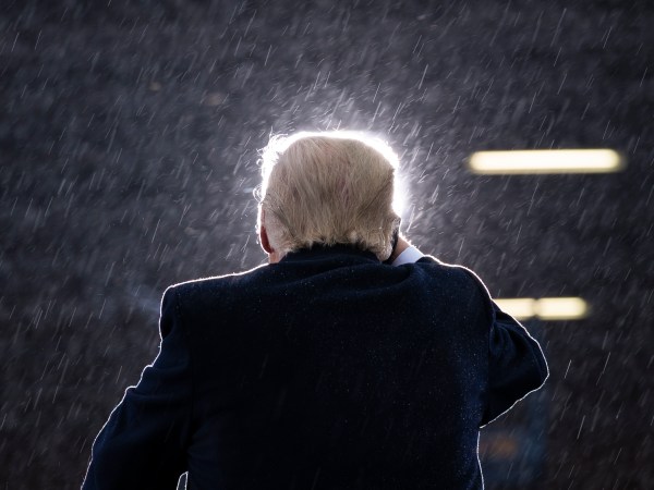 President Donald Trump speaks during a campaign rally at Capital Region International Airport, Tuesday, Oct. 27, 2020, in Lansing, Mich. (AP Photo/Evan Vucci)