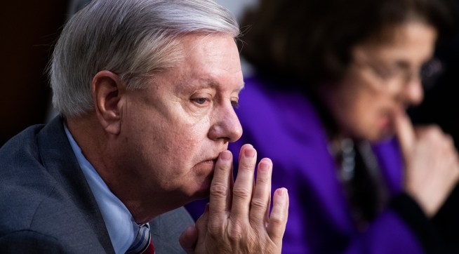 UNITED STATES - OCTOBER 15: Chairman Lindsey Graham, R-S.C., and ranking member Sen. Dianne Feinstein, D-Calif., attend the Senate Judiciary Committee executive business meeting on Supreme Court justice nominee Amy Coney Barrett in Hart Senate Office Building on Thursday, October 15, 2020. (Photo By Tom Williams/CQ Roll Call/POOL)