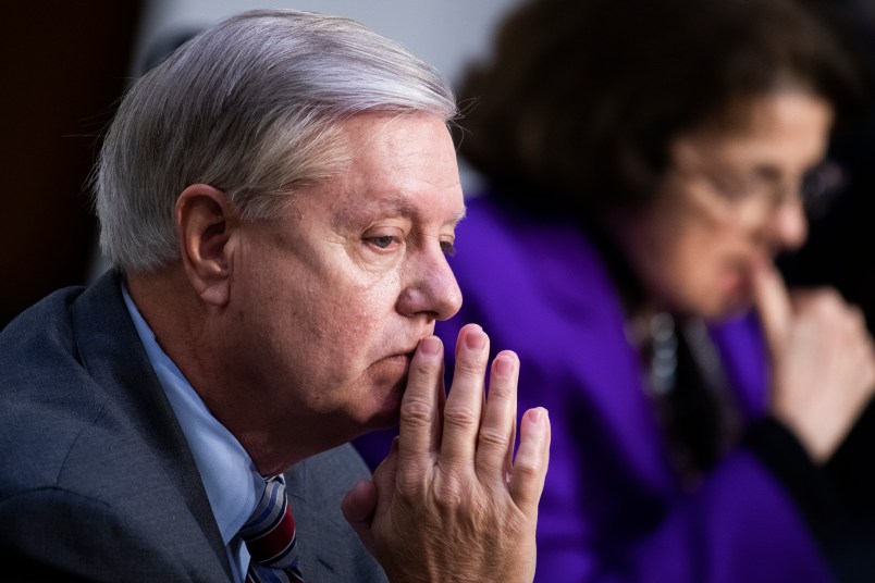 UNITED STATES - OCTOBER 15: Chairman Lindsey Graham, R-S.C., and ranking member Sen. Dianne Feinstein, D-Calif., attend the Senate Judiciary Committee executive business meeting on Supreme Court justice nominee Amy Coney Barrett in Hart Senate Office Building on Thursday, October 15, 2020. (Photo By Tom Williams/CQ Roll Call/POOL)