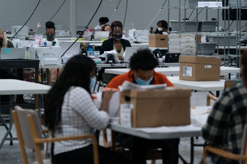 LAWRENCEVILLE, GA - NOVEMBER 07: Election personnel sort ballots in preparation for an audit at the Gwinnett County Board of Voter Registrations and Elections offices on November 7, 2020 in Lawrenceville, Georgia. (Photo by Elijah Nouvelage/Getty Images)