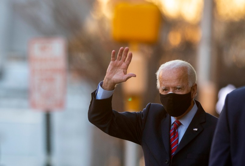 WILMINGTON, DE - NOVEMBER 23: President-elect Joe Biden waves as he departs the Queen Theatre after meeting virtually with the United States Conference of Mayors on November 23, 2020 in Wilmington, Delaware. As President-elect Biden waits to be approved for official national security briefings, the names of top members of his national security team are being announced to the public. (Photo by Mark Makela/Getty Images)