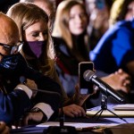 GETTYSBURG, PA - NOVEMBER 25: Jenna Ellis, a member of President Donald Trumps legal team, holds up a cell phone to the microphone so President Trump can speak during a Pennsylvania Senate Majority Policy Committee public hearing Wednesday at the Wyndham Gettysburg hotel to discuss 2020 election issues and irregularities on November 25, 2020 in Gettysburg, Pennsylvania. Giuliani is continuing his push to over turn election results in the courts. (Photo by Samuel Corum/Getty Images) *** Local Caption *** Jenna Ellis; Rudy Giuliani