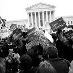WASHINGTON DC - DECEMBER 11: Protesters outside the Supreme Court on the eve of the decision on Gore v Bush that will determine the outcome of the Presidential Election on December 11, 2000 in Washington DC. (Photo by David Hume Kennerly/Getty Images)