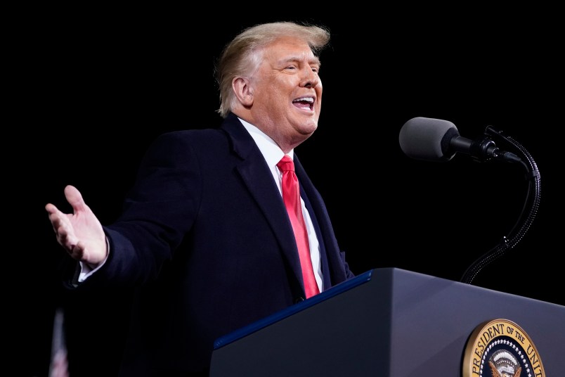 President Donald Trump speaks at a campaign rally for Senate Republican candidates, Sen. Kelly Loeffler, R-Ga., and Sen. David Perdue, R-Ga., at Valdosta Regional Airport, Saturday, Dec. 5, 2020, in Valdosta, Ga. (AP Photo/Evan Vucci)