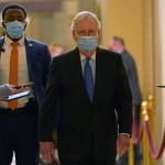 Senate Majority Leader Mitch McConnell of Ky., walks past reporters on Capitol Hill in Washington, Tuesday, Dec. 15, 2020. (AP Photo/Susan Walsh)