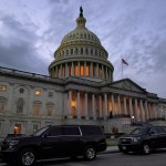 Dusk falls over the Capitol, Monday, Dec. 21, 2020, in Washington. Congressional leaders have hashed out a massive, year-end catchall bill that combines $900 billion in COVID-19 aid with a $1.4 trillion spending bill and reams of other unfinished legislation on taxes, energy, education and health care. (AP Photo/Jacquelyn Martin)