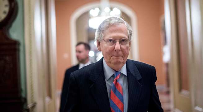 WASHINGTON, DC - Senate Majority Leader Mitch McConnell goes on and off the floor during an all night session to consider the Republican healthcare bill on Capitol Hill in Washington, DC Thursday July 27, 2017. (Photo by Melina Mara/The Washington Post)