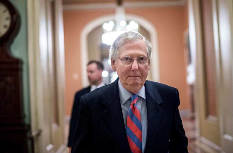 WASHINGTON, DC - Senate Majority Leader Mitch McConnell goes on and off the floor during an all night session to consider the Republican healthcare bill on Capitol Hill in Washington, DC Thursday July 27, 2017. (Photo by Melina Mara/The Washington Post)