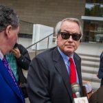 LOS ANGELES, CA - DECEMBER 03: British diver Vernon Unsworth; L, watches his attorneys; Mark Stephen; R, and L. Lin Wood; C, speaks to members of the media while they arrive at US District Court, Central District of California in Los Angeles, U.S. on December 3, 2019 in Los Angeles, California. The British diver sued the Tesla CEO Elon Musk over calling him "'Pedo Guy" and rapist. (Photo by Apu Gomes/Getty Images)