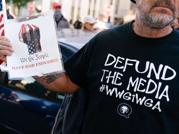 ATLANTA, GA - NOVEMBER 18: A man wearing a 'Defund the Media' QAnon shirt is seen at a "Stop the Steal" rally against the results of the U.S. Presidential election outside the Georgia State Capitol on November 18, 2020 in Atlanta, Georgia. (Photo by Elijah Nouvelage/Getty Images)
