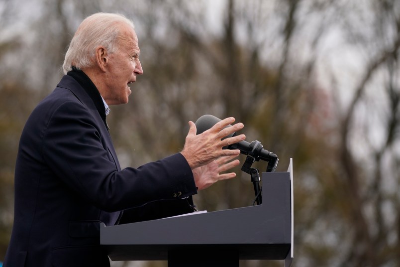 President-elect Joe Biden speaks at a drive-in rally for Georgia Democratic candidates for U.S. Senate Raphael Warnock and Jon Ossoff, Tuesday, Dec. 15, 2020, in Atlanta. (AP Photo/Patrick Semansky)