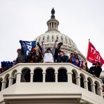 WASHINGTON, DC - JANUARY 06: Pro-Trump supporters storm the US Capitol following a rally with President Donald Trump on January 6, 2021 in Washington, DC. Trump supporters gathered in the nation's capital today to protest the ratification of President-elect Joe Biden's Electoral College victory over President Trump in the 2020 election. (Photo by Samuel Corum/Getty Images)
